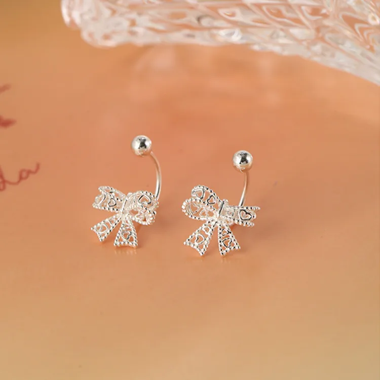 Hollow Bow Screw Buckle Puncture Stud Earrings for Women