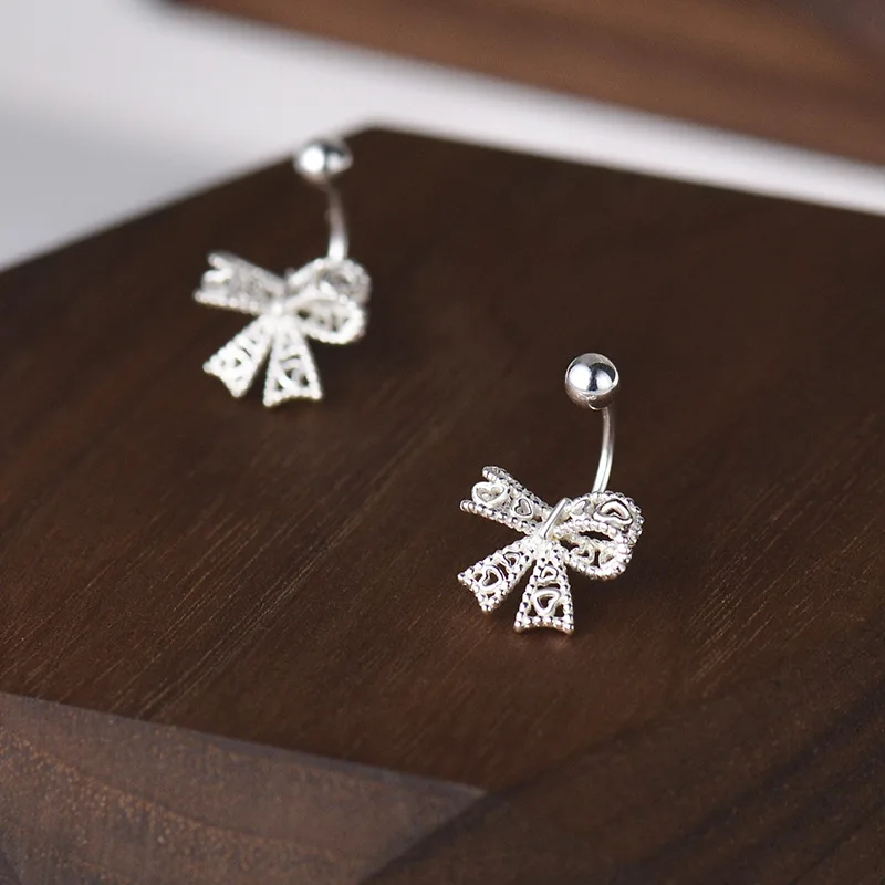 Hollow Bow Screw Buckle Puncture Stud Earrings for Women